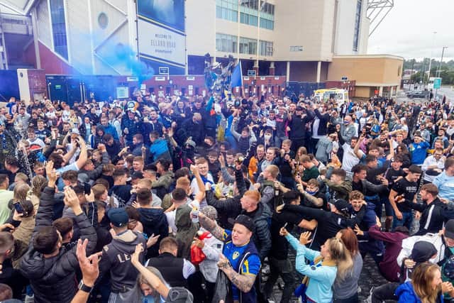 Leeds United fans celebrate at Elland Road on Saturday.