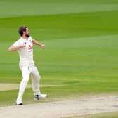 IN CONTENTION: England's Chris Woakes celebrates taking the wicket of West Indies' Kraigg Brathwaite at Old Trafford. Picture: Jon Super/NMC Pool/PA