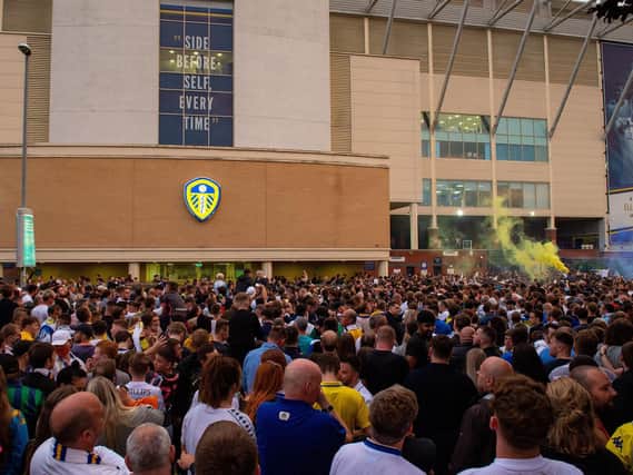 Leeds United fans celebrate promotion at Elland Road last week. (Bruce Rollinson)