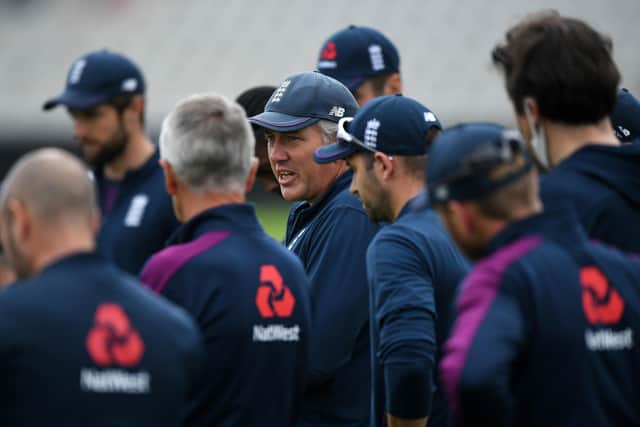 England head coach Chris Silverwood speaks to his team during Wednesday's net session at Old Trafford. Picture: Gareth Copley/Pool/PA