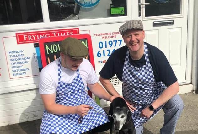 (left to right) Jonny Chapman, Charlie Tipton, the owner of Hillside Fisheries, with Gyp, the Whippet