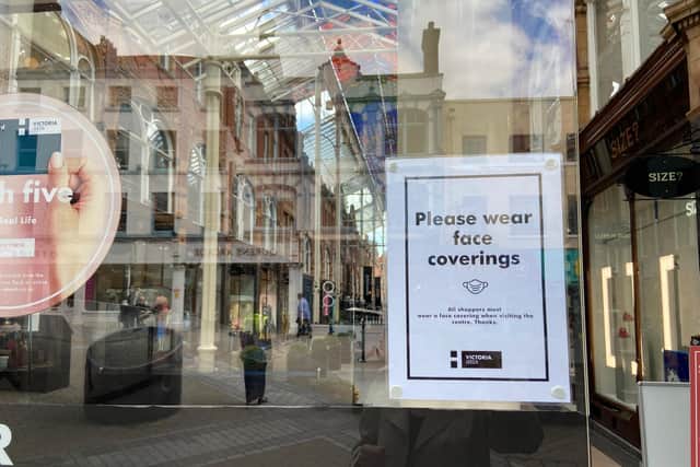 A notice on the Victoria Quarter in Leeds city centre asking customers to wear masks