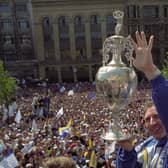 LEGEND: Howard Wilkinson with the 1992 Division One trophy - two years after Leeds United had come up as Division Two champions. Picture by YPN.