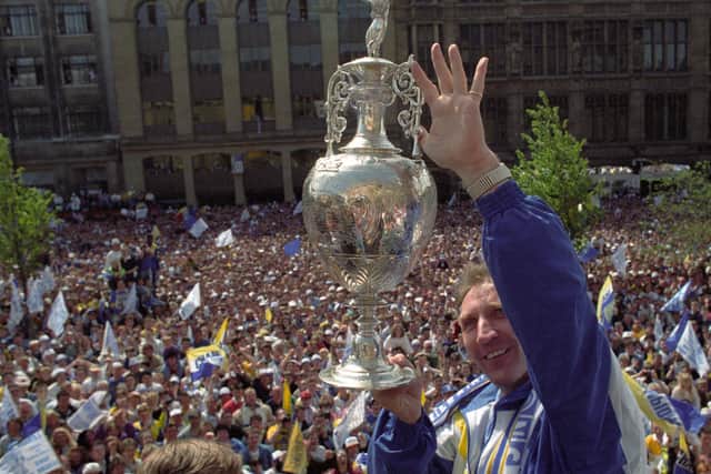 LEGEND: Howard Wilkinson with the 1992 Division One trophy - two years after Leeds United had come up as Division Two champions. Picture by YPN.