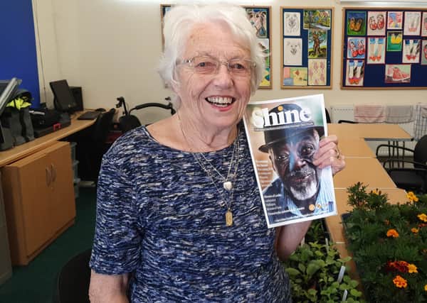 Joan Bennet with her copy of Shine magazine which has helped older people in Leeds feel connected during lockdown.