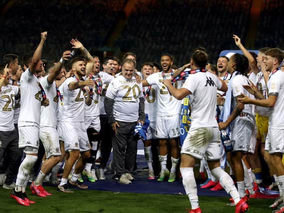 IN CONTROL: Head coach Marcelo Bielsa, centre, celebrates Leeds United's Championship title triumph surrounded by his jubilant players. Picture by Tim Goode/PA Wire.