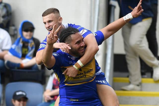 Ash Handley and Konrad Hurrell celebrate a try against Catalans Dragons last season. Picture by Jonathan Gawthorpe.