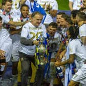 THE TOP MAN: Leeds United head coach Marcelo Bielsa with the Championship trophy. Picture by Tony Johnson.