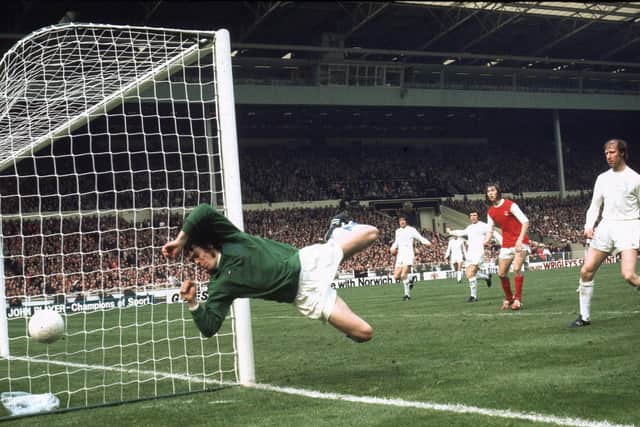SAFE HANDS: Leeds United goalkeeper David Harvey flies through the air as centre-back Jack Charlton looks on in the 1972 FA Cup final against Arsenal. Photo by A.Jones/Express/Getty Images.