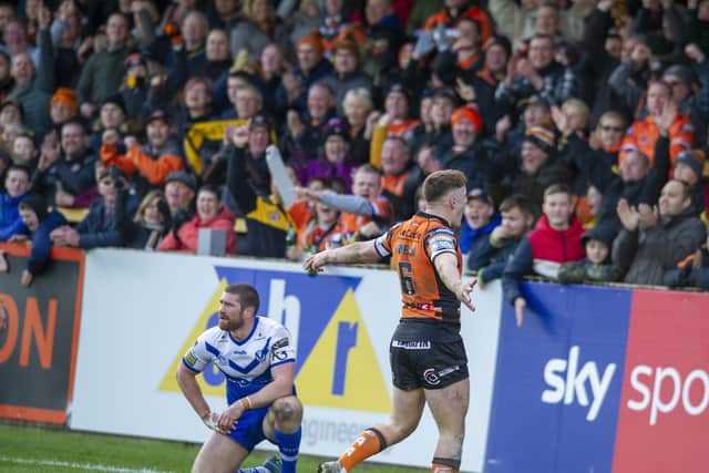 Jake Trueman's try helped Tigers beat St Helens in their final game before lockdown. Picture by Tony Johnson.