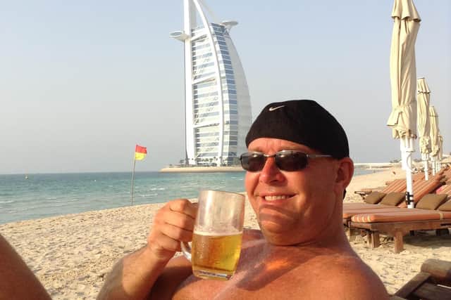 On holiday in Dubai in happier times.