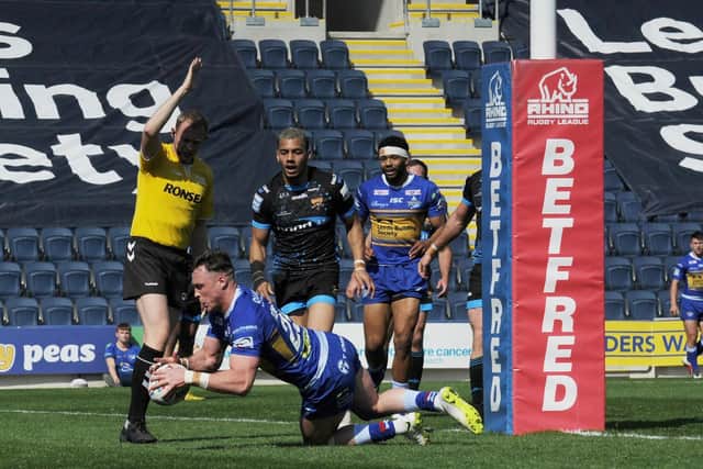 James Donaldson scores in Leeds' win over Huddersfield last season. Picture by Steve Riding.