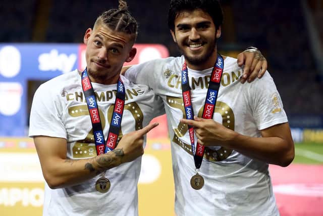 CHAMPION: Pascal Struijk, right, celebrates Leeds United's Championship title triumph with Whites team-mate Kalvin Phillips. Picture by PA.