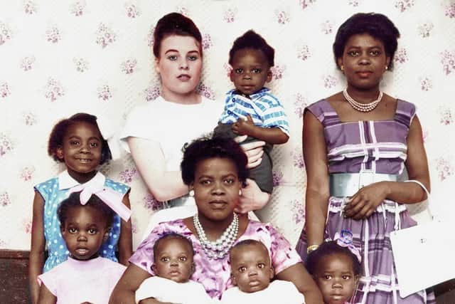 The late Clarissa Louisa Sewell (front centre) came from Jamaica in 1955. 
She and her husband Hugh raised 11 children, five of whom are pictured here.
Also pictured are  her sister Emily Hyde (right ) and family friend Pat  (back row, centre.) 
Mrs Sewell was a nursing assistant at Meanwood Park Hospital until the couples retirement to Jamaica in 1995.
 Original black and white photo: Gerald Donne