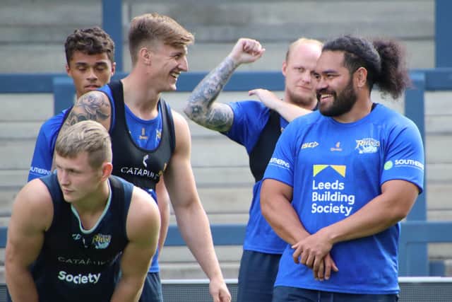 Alex Mellor and Konrad Hurrell, top, enjoy a joke in training ahead of Sunday’s match against Huddersfield Giants. Picture: Phil Daly/Leeds Rhinos/SWpix.com.