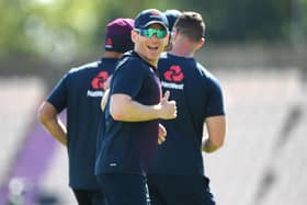 England captain Eoin Morgan shares a joke with team mates during a nets session at the Ageas Bowl. Picture: Stu Forster/Pool/PA