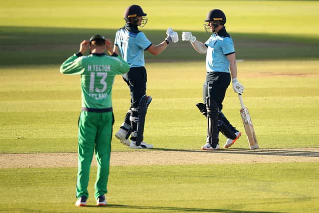 England's Sam Billings (left) and captain Eoin Morgan fist bump after winning the First One Day International of the Royal London Series at the Ageas Bowl, Southampton. PA Photo. Issue date: Thursday July 30, 2020. See PA story CRICKET England. Photo credit should read: Adam Davy/NMC Pool/PA Wire. RESTRICTIONS: Editorial use only. No commercial use without prior written consent of the ECB. Still image use only. No moving images to emulate broadcast. No removing or obscuring of sponsor logos.