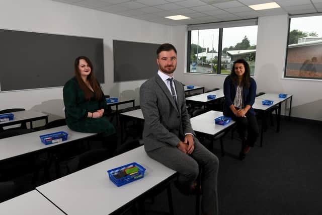 Ashley Jacobs pictured with teachers O'nika Jones (right) and Kristina Lamb-George at Dixons Trinity Chapeltown. Picture by Simon Hulme
