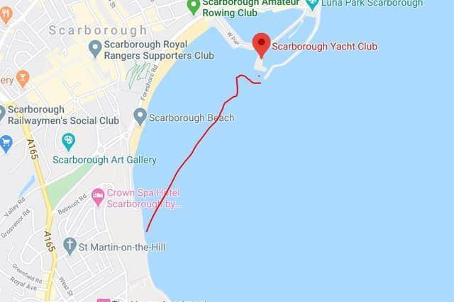 The red line shows the approximate distance across South Bay the boy was blown when he was swept out to sea