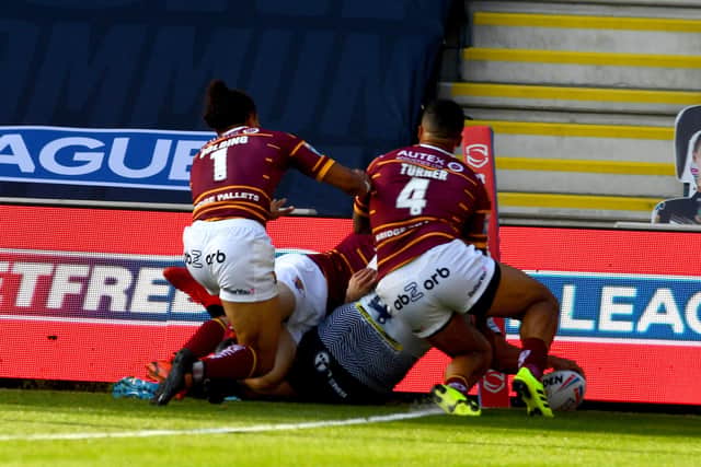 02 August 2020. Picture James Hardisty.Huddersfield Giants v Leeds Rhino's, in the Betfred Super League match held at Emerald Headingley Stadium, Leeds. Pictured Konrad Hurrell, of Leeds Rhinos, scoring a try.