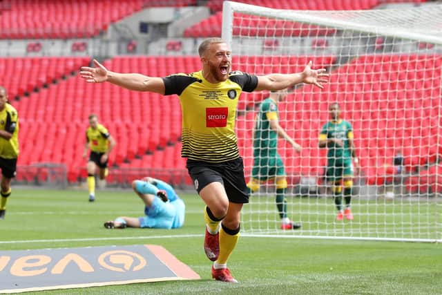 MAN OF THE MOMENT: George Thomson celebrates scoring Haoorgate Town's first goal against Notts County at Wembley Stadium. Picture: Catherine Ivill/Getty Images