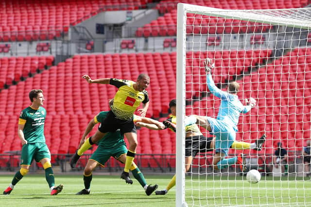 DOUBLE TROUBLE: Harrogate Town's Connor Hall scores his side's second goal against Notts County at Wembley Stadium. Picture: Catherine Ivill/Getty Images