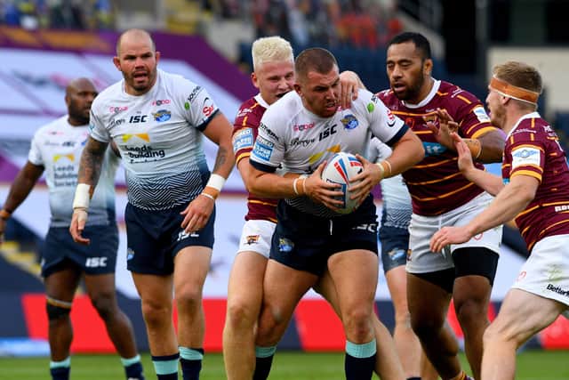 02 August 2020. Picture James Hardisty.
Huddersfield Giants v Leeds Rhino's, in the Betfred Super League match held at Emerald Headingley Stadium, Leeds. Pictured Cameron Smith, of Leeds Rhinos, is tackled for the ball.