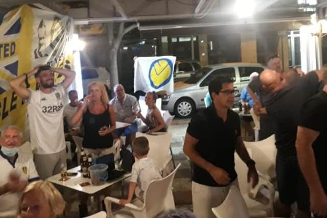 Fan celebrations outside the bar