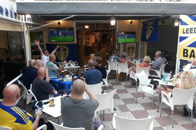 Fan celebrations outside the bar