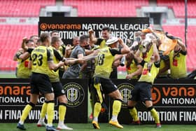 MAGIC MOMENT: Josh Falkingham of Harrogate Town lifts the trophy at Wembley Stadium. Picture: Catherine Ivill/Getty Images)