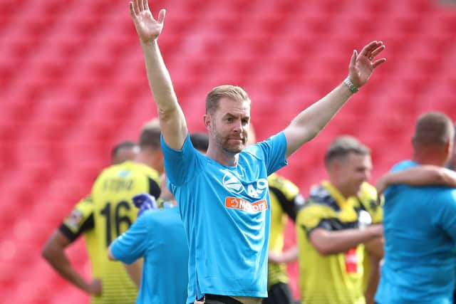 GOING UP: Harrogate Town manager Simon Weaver celebrates after the final whistle at Wembley Stadium. Picture: Adam Davy/PA