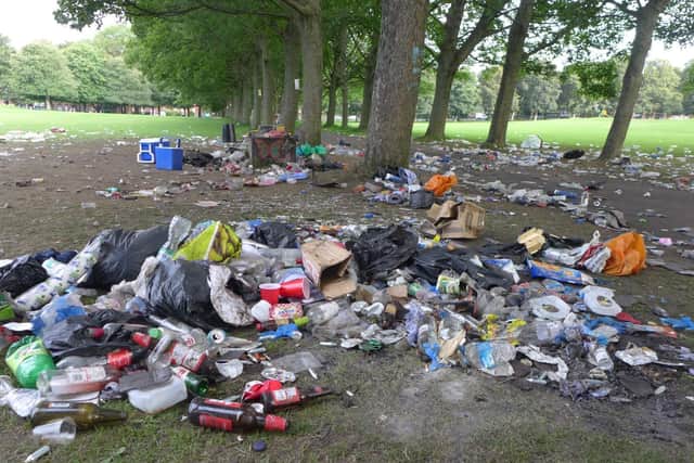 Rubbish left dumped on Woodhouse Moor in Leeds the morning after a massive party on the nighht of Friday July 31
