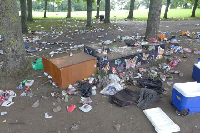 Rubbish  on Woodhouse Moor the morning after a massive party on the night of Friday July 31