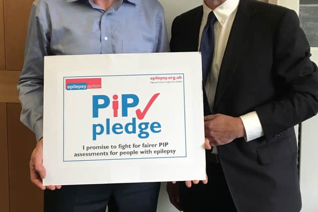 Philip Lee, the chief executive of Epilepsy Action, right, with Norman Lamb.