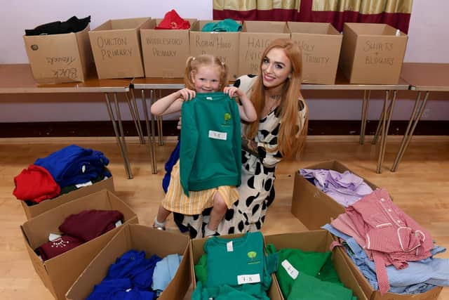 Alice Hennigan with her daughter Delores at Blackburn Hall, Rothwell, ready to handout the clothes (photo: Simon Hulme).