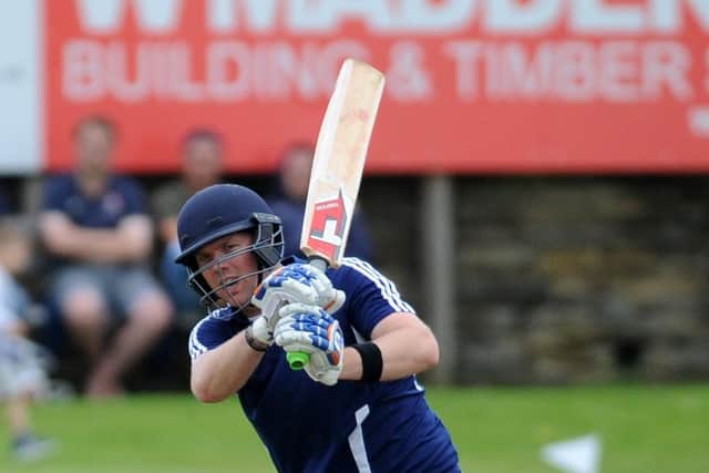 BIG HITS: Hanging Heaton's David Stiff hammered an unbeaten 86 off just 26 balls against Batley. Picture: Steve Riding.