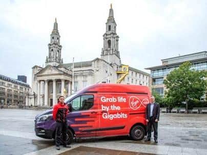 Virgin Media engineer James Crosby and Councillor James Lewis, Leeds City Councils deputy leader and executive member for resources, outside Leeds Civic Hall to mark the launch of Virgin Medias Gig1 broadband being made available to homes across the city. Credit: VirginMedia/JeremyKelly
