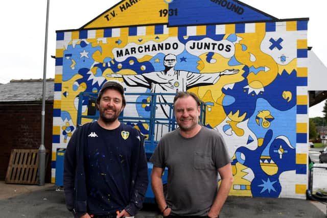 Artists Andy McVeigh (left) and Nicolas Dixon in front of the mural on Oldfield Lane, Wortley, Leeds..Picture by Simon Hulme