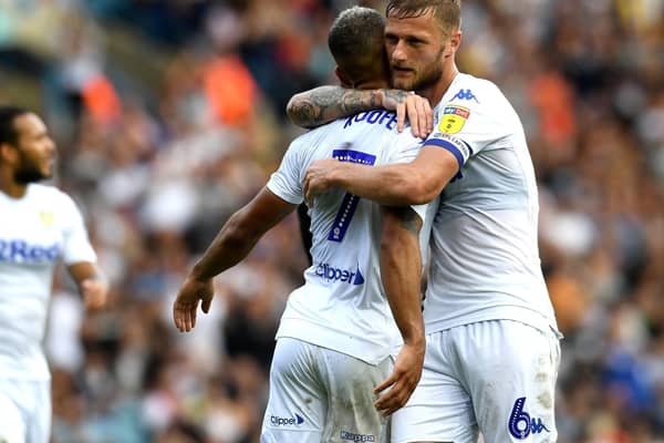 RESPECT: Liam Cooper hugs Kemar Roofe after Leeds United's friendly against Las Palmas in July 2018 in which Roofe bagged late winner. Picture by Jonathan Gawthorpe.