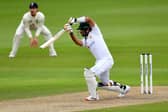 LEADING ROLE: Pakistan's Babar Azam drives on the up through the covers on day one at Old Trafford. Picture: Dan Mullan/NMC Pool/PA.