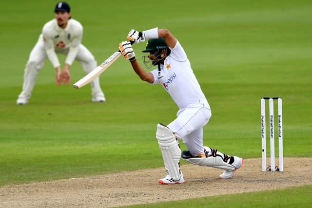 LEADING ROLE: Pakistan's Babar Azam drives on the up through the covers on day one at Old Trafford. Picture: Dan Mullan/NMC Pool/PA.