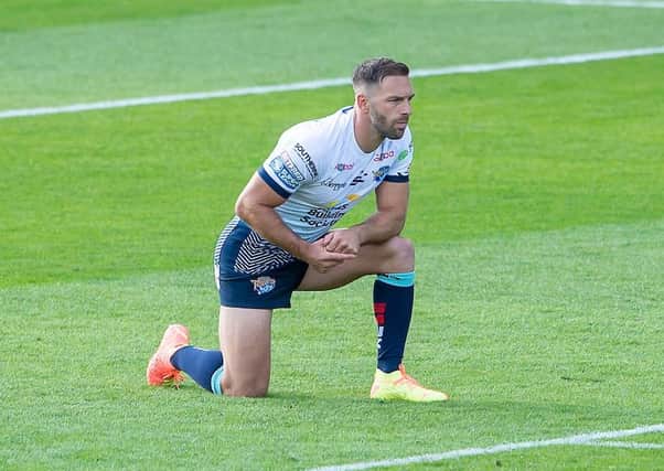 Luke Gale takes a knee before Leeds Rhinos' clash with Huddersfield Giants on Sunday.  Picture: Allan McKenzie/SWpix.com.