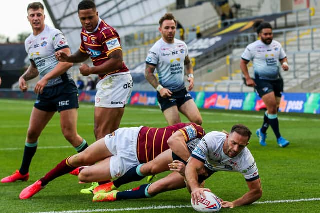 Luke Gale starts the Leeds Rhinos fightback against Huddersfield Giants with his second-half try. Picture: Alex Whitehead/SWpix.com.
