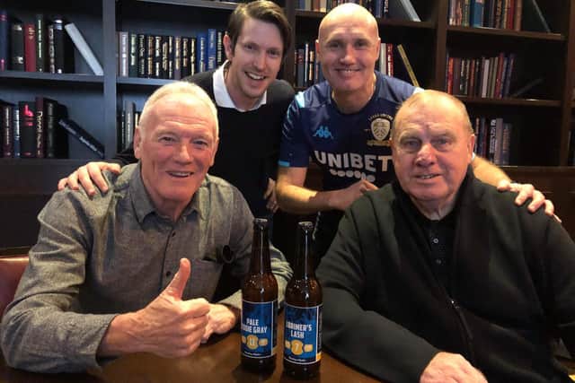 LUSCOS members Svend Karlsen and Anders Palm present Eddie Gray and Peter Lorimer with their special edition beer.