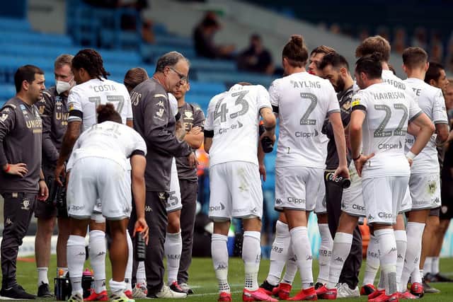 CALM: Leeds United head coach Marcelo Bielsa with his players during the incredibly tense victory at home to Barnsley. Picture by Martin Rickett/PA Wire.