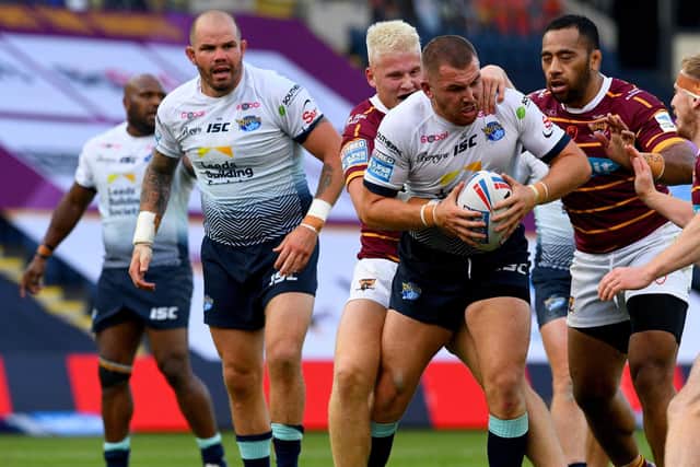 Cameron Smith is tackled during last week's game. Picture by James Hardisty.