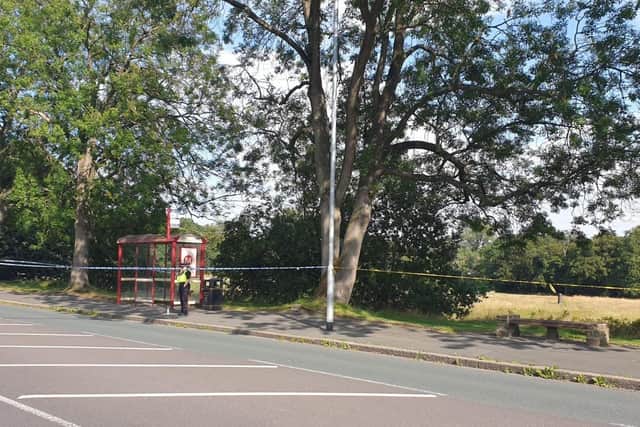 A police scene in place at Parklands Drive, near the Carr Manor fields.