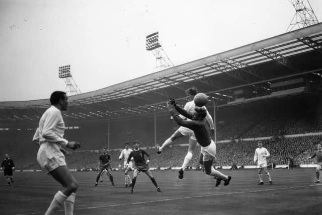 BACK WITH A BANG: Jack Charlton and goalkeeper Gary Sprake clear Leeds United's lines in the 1975 FA Cup final against Liverpool at Wembley. Photo by Douglas Miller/Keystone/Getty Images.