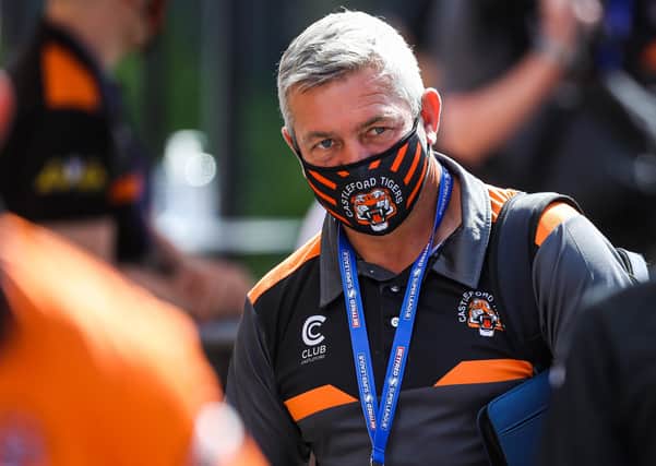 Masked man: Castleford's head coach Daryl Powell arrives at the stadium. Picture: SWPix