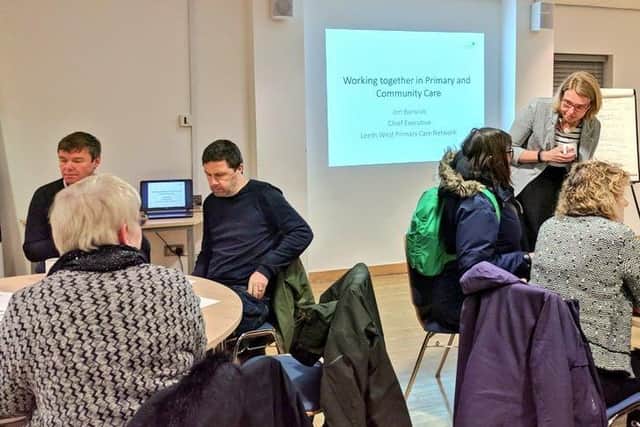 A  primary and community care meeting about the need to work together.